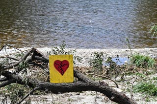 A painted broken heart is seen near Camp Mystic on July 8